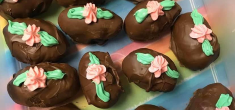 a close up of a box of chocolate covered easter eggs.