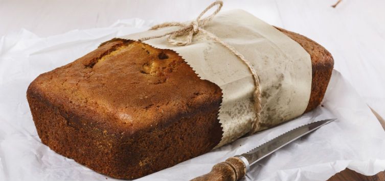 a loaf of bread with the middle wrapped in papper.