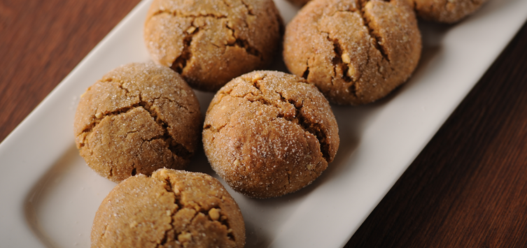 a plate of peanut cookies on a table.