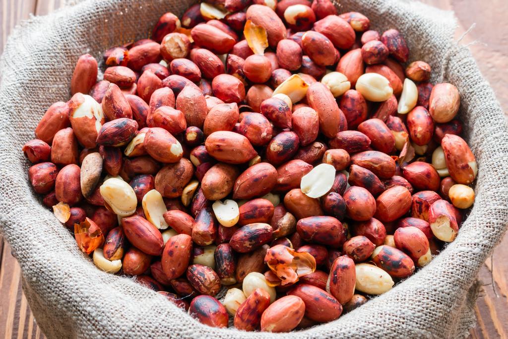 a cloth sack filled with roasted peanuts.