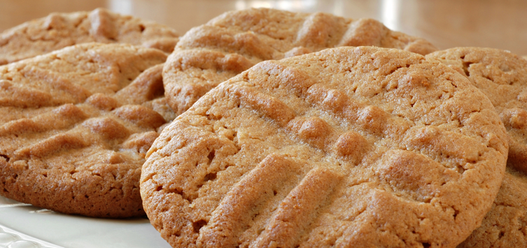 a tray filled with crunchy peanut cookies.