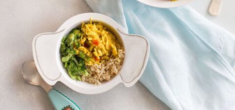 a kids bowl full of rice